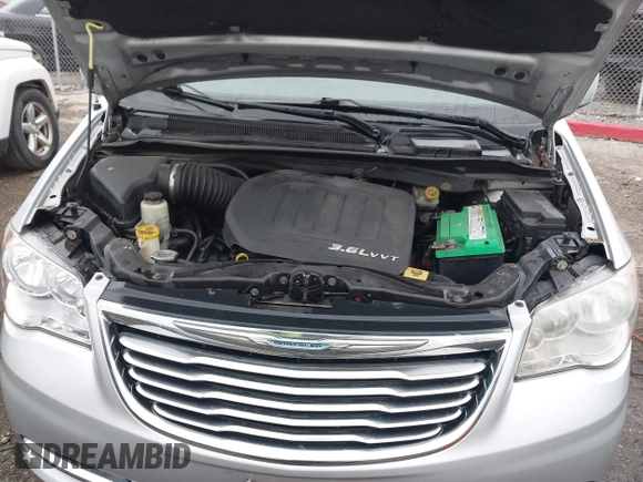 2012 Chrysler Town & Country Touring with VIN 2C4RC1BGXCR213014, listed as a IAAI auction lot 41997723 with 143,848 mi miles. Bid and sale history available at carsss.com. Image 10.