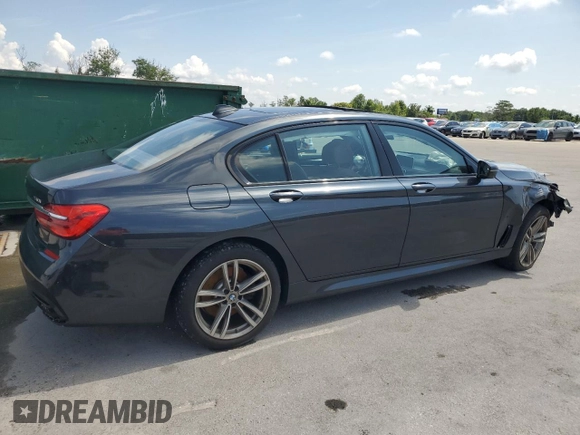 2017 BMW 7 Series 740i with VIN WBA7E2C53HG739365, listed as a Copart auction lot 58234325 with Not provided miles and Salvage title. Bid and sale history available at DreamBid. Image 3.