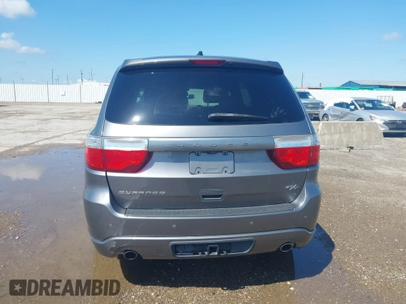 2013 Dodge Durango R/T z VIN 1C4SDHCT7DC564802, wystawiony jako IAAI lot #42348957 z przebiegiem 178 354 mil mil oraz . Historia ofert i sprzedaży dostępna na DreamBid. Obrazek 16.