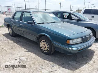 1996 Oldsmobile Cutlass Ciera 1SA VX5 z VIN 1G3AJ55M5T6418193, wystawiony jako IAAI lot #42361441 z przebiegiem 193 675 mil mil oraz . Historia ofert i sprzedaży dostępna na DreamBid. Obrazek 1.