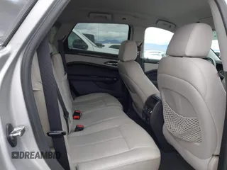 2015 Cadillac SRX with VIN 3GYFNAE34FS629258, listed as a IAAI auction lot 41788601 with 56,939 mi miles and . Bid and sale history available at DreamBid. Image 8.
