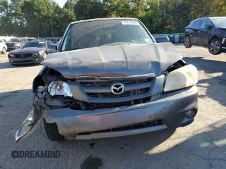 2006 Mazda Tribute S with VIN 4F2YZ06136KM31485, listed as a Copart auction lot 75412344 with Not Provided miles and Salvage Title. Bid and sale history available at DreamBid. Image 5.
