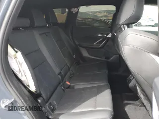 2023 BMW X1 xDrive28i z VIN WBX73EF00P5W09504, wystawiony jako Copart lot #51855325 z przebiegiem 37 759 mil mil oraz Szkoda całkowita • Salvage title. Historia ofert i sprzedaży dostępna na DreamBid. Obrazek 12.
