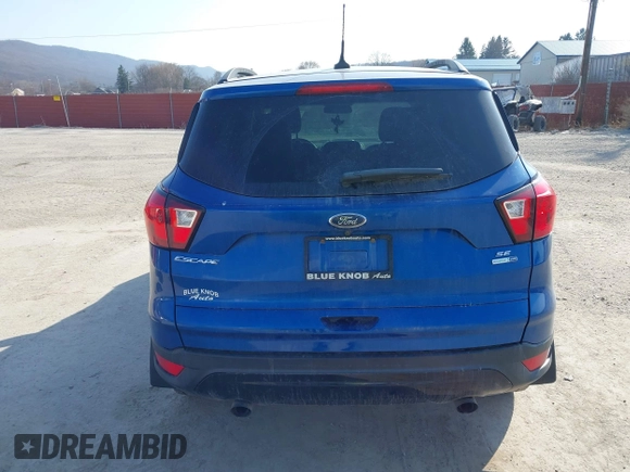 2019 Ford Escape SE with VIN 1FMCU9GD7KUB44070, listed as a IAAI auction lot 41801706 with 77,612 mi miles. Bid and sale history available at carsss.com. Image 16.