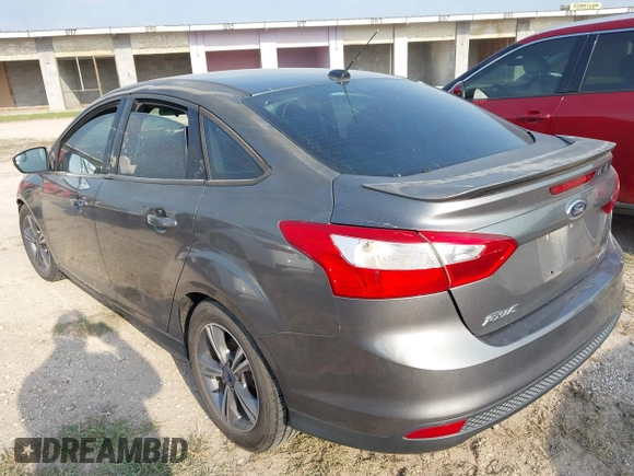 2014 Ford Focus SE with VIN 1FADP3F24EL320991, listed as a IAAI auction lot 41932638 with 133,163 mi miles. Bid and sale history available at carsss.com. Image 3.