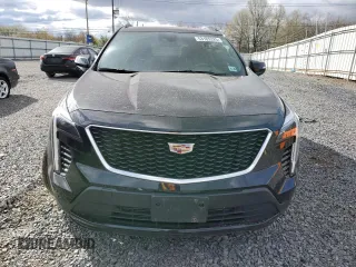 2023 Cadillac XT4 AWD Sport z VIN 1GYFZFR45PF128521, wystawiony jako Copart lot #53185325 z przebiegiem 17 657 mil mil oraz Szkoda całkowita • Salvage title. Historia ofert i sprzedaży dostępna na DreamBid. Obrazek 5.