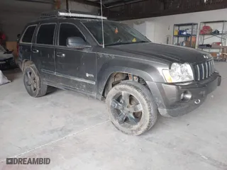 2006 Jeep Grand Cherokee Laredo with VIN 1J8GR48K76C280985, listed as a IAAI auction lot 42015127 with 257,358 mi miles. Bid and sale history available at carsss.com. Image 1.