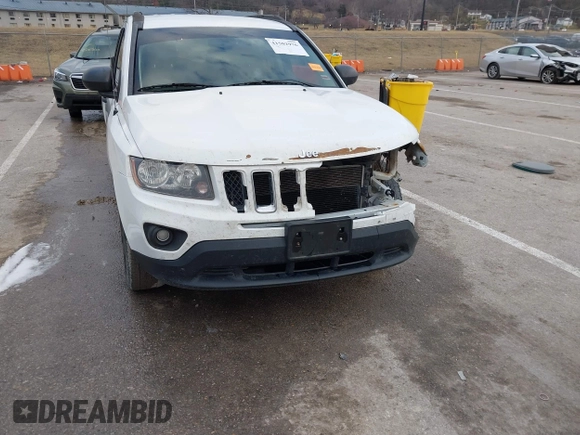 2016 Jeep Compass Sport with VIN 1C4NJDBB5GD804581, listed as a IAAI auction lot 41502976 with 196,351 mi miles and . Bid and sale history available at carsss.com. Image 19.