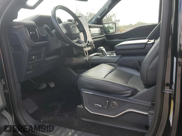 2022 Ford F-150 Lightning Pro z VIN 1FT6W1EV4NWG14041, wystawiony jako Copart lot #85252844 z przebiegiem 31 093 mil mil oraz Szkoda całkowita • Salvage title. Historia ofert i sprzedaży dostępna na DreamBid. Obrazek 7.