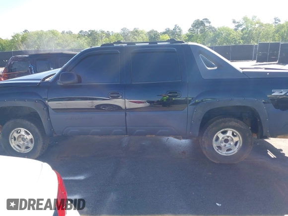 2002 Chevrolet Avalanche with VIN 3GNEK13T42G142319, listed as a IAAI auction lot 41977733 with Not Provided miles and . Bid and sale history available at DreamBid. Image 14.