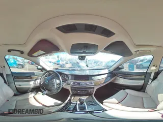 2011 BMW 7 Series 750i xDrive с VIN WBAKC6C59BC394610, выставлен на аукционе Copart как лот 52459035 с пробегом 171 581 миль миль и Списание • Salvage title. История ставок и продаж доступна на DreamBid. Изображение 12.