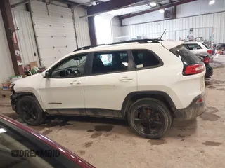 2016 Jeep Cherokee Latitude with VIN 1C4PJMCB0GW226093, listed as a IAAI auction lot 41683652 with 130,168 mi miles and . Bid and sale history available at DreamBid. Image 14.