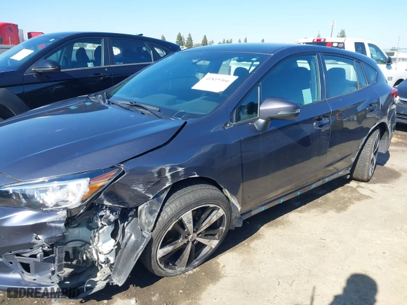 2017 Subaru Impreza Sport with VIN 4S3GTAK61H1731989, listed as a IAAI auction lot 41819366 with 93,369 mi miles. Bid and sale history available at carsss.com. Image 6.