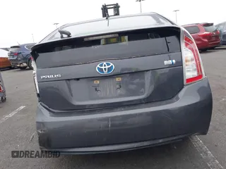 2015 Toyota Prius Four z VIN JTDKN3DU6F1977249, wystawiony jako IAAI lot #42490112 z przebiegiem 173 479 mil mil oraz . Historia ofert i sprzedaży dostępna na DreamBid. Obrazek 16.