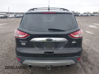 2013 Ford Escape SEL with VIN 1FMCU9H95DUC64995, listed as a IAAI auction lot 40821020 with 120,114 mi miles. Bid and sale history available at carsss.com. Image 16.
