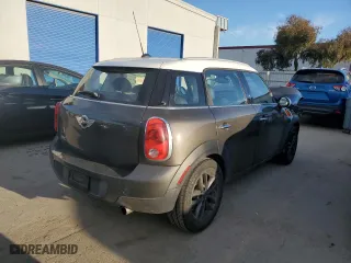2013 MINI Cooper Countryman with VIN WMWZB3C55DWM08553, listed as a Copart auction lot 88506725 with 101,317 mi miles and Salvage Title. Bid and sale history available at carsss.com. Image 3.