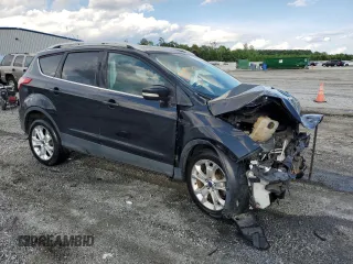2015 Ford Escape Titanium with VIN 1FMCU0J96FUC59510, listed as a Copart auction lot 57091765 with 120,586 mi miles and Salvage title. Bid and sale history available at DreamBid. Image 4.
