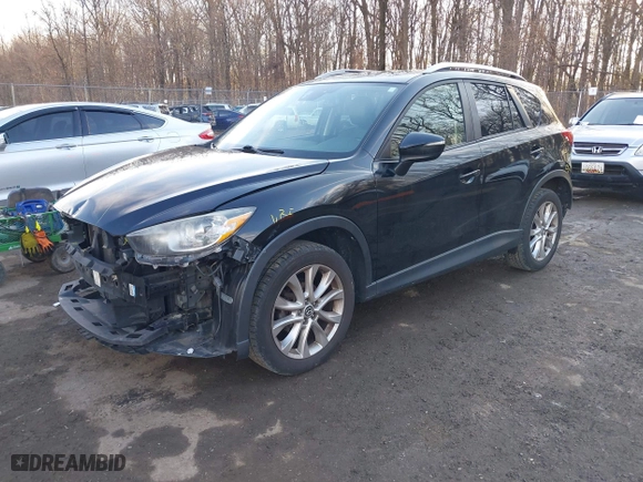2015 Mazda CX-5 Grand Touring with VIN JM3KE4DY4F0510823, listed as a IAAI auction lot 41542682 with 158,515 mi miles. Bid and sale history available at carsss.com. Image 17.
