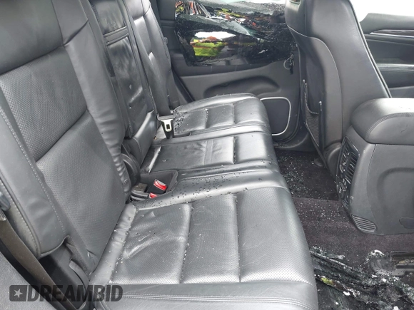 2016 Jeep Grand Cherokee Overland with VIN 1C4RJFCG0GC406160, listed as a IAAI auction lot 42716239 with 95,420 mi miles and . Bid and sale history available at DreamBid. Image 8.