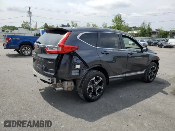 2018 Honda CR-V Touring with VIN 7FARW2H93JE048507, listed as a Copart auction lot 64071705 with 69,051 mi miles and Salvage title. Bid and sale history available at DreamBid. Image 3.