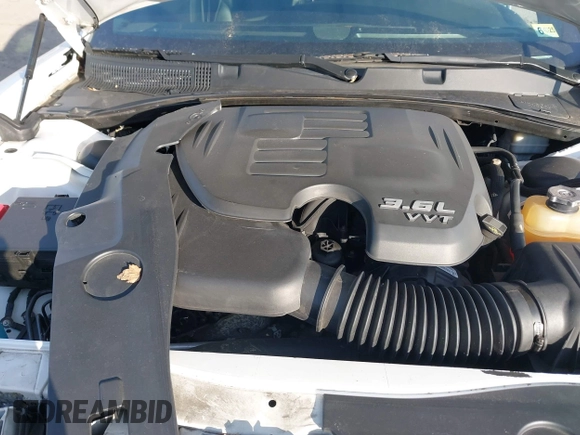 2014 Dodge Charger SXT with VIN 2C3CDXHG6EH359856, listed as a IAAI auction lot 41631987 with 144,355 mi miles and . Bid and sale history available at DreamBid. Image 10.
