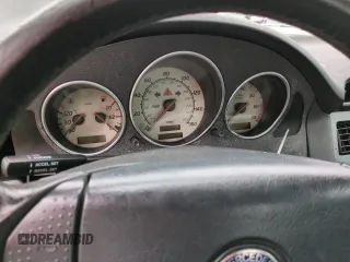 1999 Mercedes-Benz SLK-Class with VIN WDBKK47F5XF094256, listed as a Copart auction lot 75080164 with 0 mi miles and Salvage Title. Bid and sale history available at carsss.com. Image 9.
