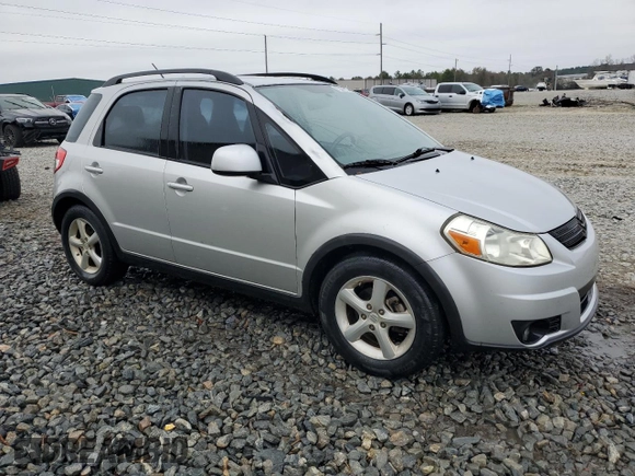 2009 Suzuki SX4 with VIN JS2YB413195101423, listed as a Copart auction lot 85321624 with 127,917 mi miles and Salvage Title. Bid and sale history available at carsss.com. Image 4.