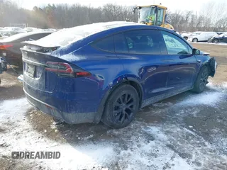 2022 Tesla Model X Plaid z VIN 7SAXCBE69NF343318, wystawiony jako IAAI lot #41387403 z przebiegiem Nie podano mil oraz . Historia ofert i sprzedaży dostępna na DreamBid. Obrazek 4.