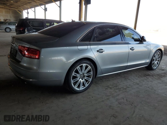 2012 Audi A8 with VIN WAURVAFD0CN028037, listed as a Copart auction lot 61004815 with 97,424 mi miles and Salvage title. Bid and sale history available at DreamBid. Image 3.