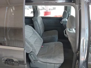 2004 Honda Odyssey EX with VIN 5FNRL18624B056333, listed as a IAAI auction lot 42143860 with 165,687 mi miles and . Bid and sale history available at DreamBid. Image 8.
