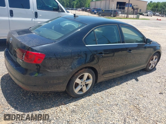 2014 Volkswagen Jetta TDI w/Premium with VIN 3VW3L7AJ6EM420044, listed as a IAAI auction lot 42569620 with 143,482 mi miles and . Bid and sale history available at DreamBid. Image 4.
