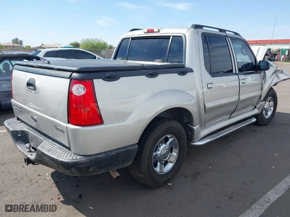 2004 Ford Explorer Sport Trac XLS with VIN 1FMZU77K84UC04230, listed as a IAAI auction lot 41909068 with 237,662 mi miles. Bid and sale history available at carsss.com. Image 4.