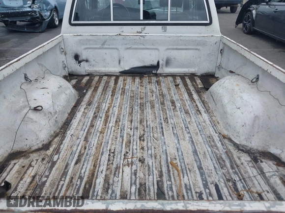 1992 Toyota Pickup DLX with VIN JT4RN93P9N5064411, listed as a IAAI auction lot 41787535 with 170,294 mi miles and . Bid and sale history available at DreamBid. Image 17.