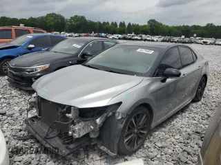 2018 Toyota Camry XSE with VIN 4T1BZ1HK7JU015515, listed as a Copart auction lot 56379485 with 128,488 mi miles and Salvage title. Bid and sale history available at DreamBid. Image 1.
