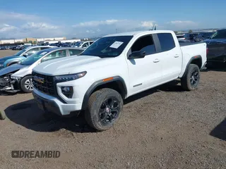 2024 GMC Canyon 4WD Elevation with VIN 1GTP6BEK9R1130353, listed as a IAAI auction lot 41967300 with 10,966 mi miles and . Bid and sale history available at carsss.com. Image 2.
