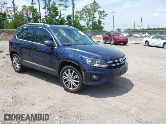 2012 Volkswagen Tiguan SEL with VIN WVGAV7AX7CW608637, listed as a IAAI auction lot 42173987 with 149,013 mi miles and . Bid and sale history available at DreamBid. Image 1.