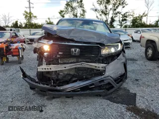 2023 Honda Ridgeline RTL-E with VIN 5FPYK3F79PB010418, listed as a Copart auction lot 62272845 with 39,739 mi miles and Salvage title. Bid and sale history available at DreamBid. Image 5.
