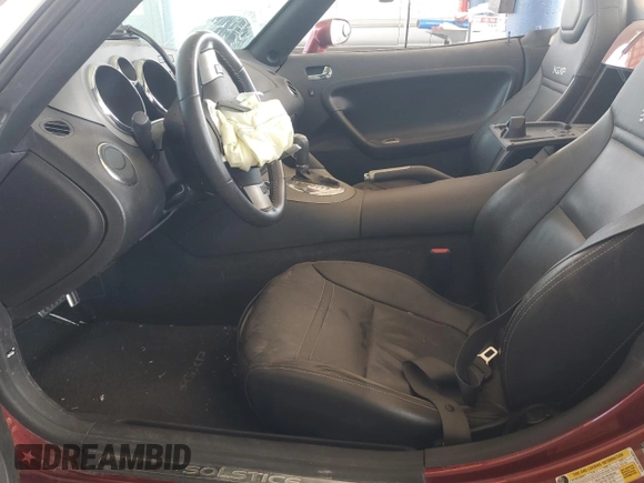 2009 Pontiac Solstice GXP z VIN 1G2MT35X59Y105815, wystawiony jako Copart lot #74302574 z przebiegiem Nie podano mil oraz Szkoda całkowita • Salvage title. Historia ofert i sprzedaży dostępna na DreamBid. Obrazek 7.
