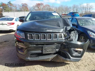 2019 Jeep Compass Latitude with VIN 3C4NJDBB6KT593734, listed as a IAAI auction lot 40871646 with 84,197 mi miles and . Bid and sale history available at DreamBid. Image 12.
