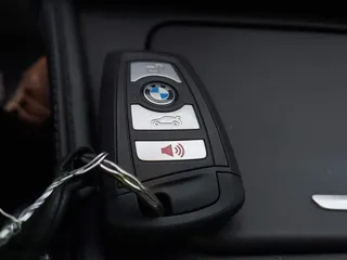 2013 BMW M5 with VIN WBSFV9C51DD095750, listed as a IAAI auction lot 40907304 with 93,014 mi miles. Bid and sale history available at carsss.com. Image 11.
