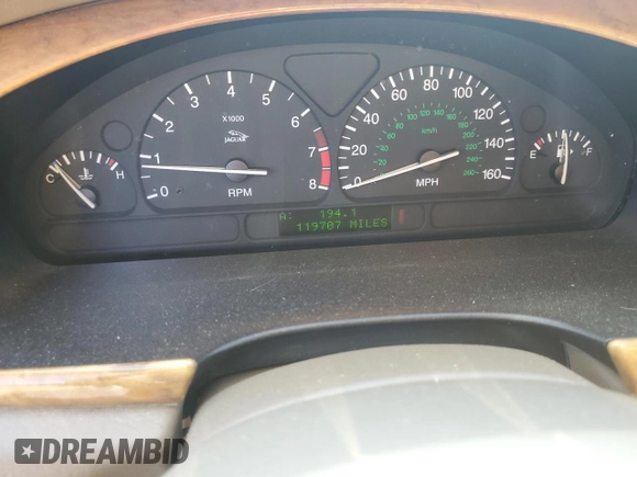 2002 Jaguar S-Type with VIN SAJDA01P52GM27504, listed as a Copart auction lot 57850944 with 119,707 mi miles and Clean Title. Bid and sale history available at DreamBid. Image 9.
