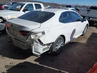 2022 Toyota Camry Hybrid LE with VIN 4T1C31AK7NU588937, listed as a IAAI auction lot 41401438 with 50,361 mi miles and . Bid and sale history available at carsss.com. Image 4.