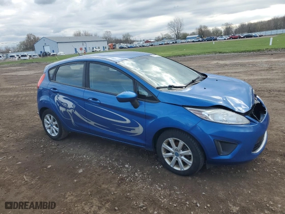 2011 Ford Fiesta SE with VIN 3FADP4EJ6BM228323, listed as a Copart auction lot 53001145 with 174,776 mi miles and Salvage Title. Bid and sale history available at carsss.com. Image 4.