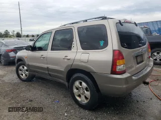 2002 Mazda Tribute LX with VIN 4F2YU09132KM24637, listed as a Copart auction lot 88919855 with 211,198 mi miles and Salvage Title. Bid and sale history available at carsss.com. Image 2.