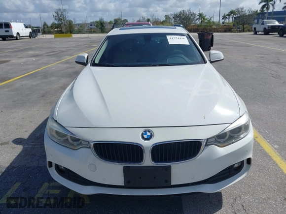 2015 BMW 4 Series 428i xDrive with VIN WBA4C9C56FG135520, listed as a IAAI auction lot 41574336 with 70,870 mi miles and . Bid and sale history available at carsss.com. Image 6.