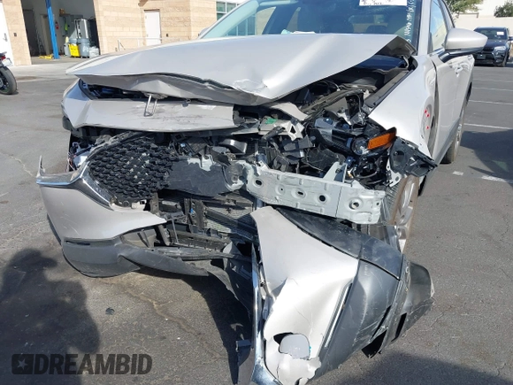 2024 Mazda CX-30 S Preferred with VIN 3MVDMBCM7RM638304, listed as a IAAI auction lot 41396590 with 15,702 mi miles and . Bid and sale history available at DreamBid. Image 6.