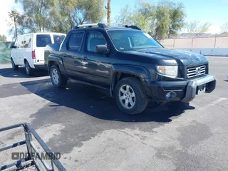 2007 Honda Ridgeline RTL w/Leather with VIN 2HJYK16577H547869, listed as a IAAI auction lot 41939741 with 248,916 mi miles. Bid and sale history available at carsss.com. Image 1.