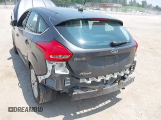 2016 Ford Focus Titanium with VIN 1FADP3N28GL299339, listed as a IAAI auction lot 42410154 with 78,245 mi miles and . Bid and sale history available at DreamBid. Image 6.
