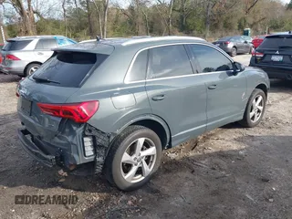 2019 Audi Q3 Premium with VIN WA1AECF37K1076492, listed as a IAAI auction lot 41099499 with 80,975 mi miles and . Bid and sale history available at DreamBid. Image 4.