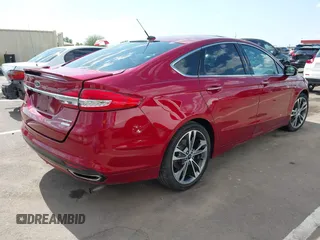 2017 Ford Fusion Titanium with VIN 3FA6P0K98HR207447, listed as a IAAI auction lot 42422213 with 59,549 mi miles and . Bid and sale history available at DreamBid. Image 4.